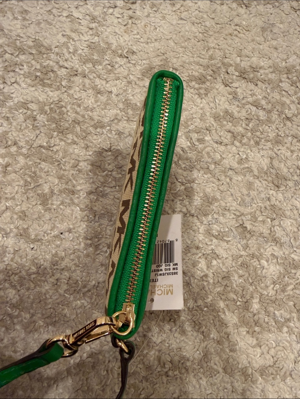 New Michael Kors Tan and Green Logo
Wristlet - Picture 7 of 11